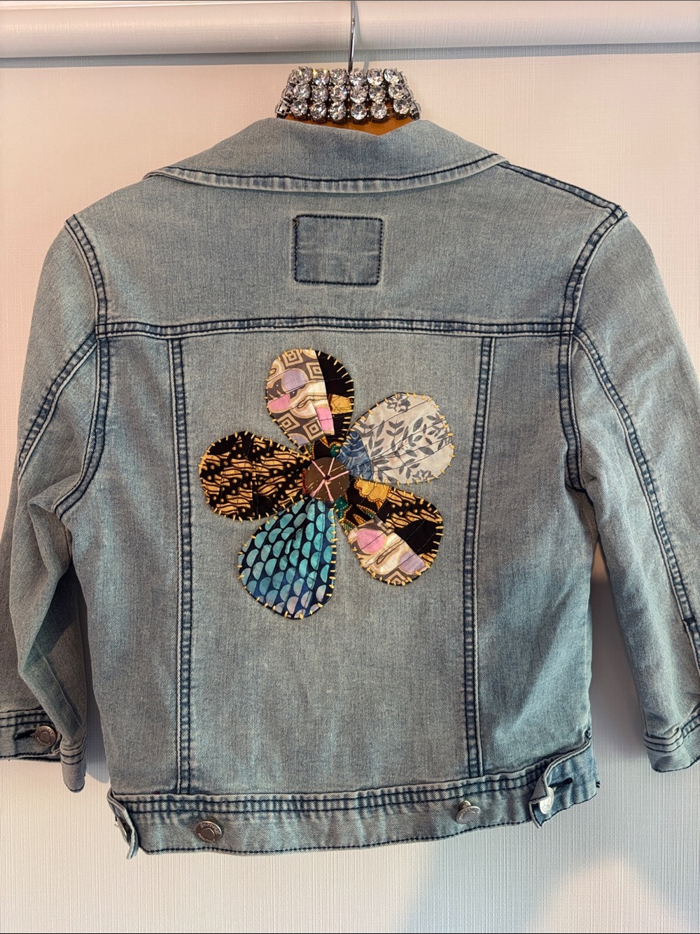 Light Wash Denim Jacket with Patchwork Flower, fabric trim, beautiful lined pane